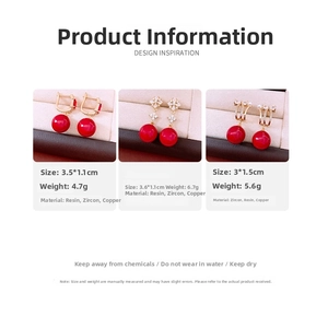 Detail view of 18K gold plated zircon and red resin drop earrings with exact dimensions