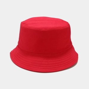 Close-up of a red cotton bucket hat featuring reinforced multi-row stitching on the brim