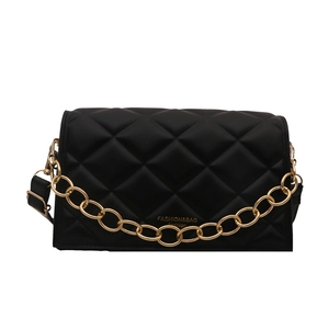 Chic black quilted crossbody bag with golden chain strap and minimalist square design