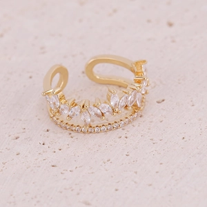 Detailed close-up of a double-layered gold open ring with micro-set zircon crystals