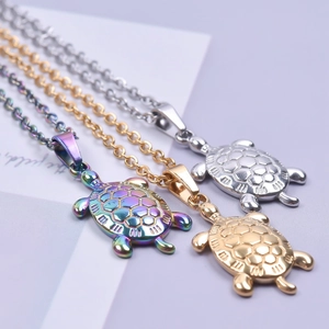 Polished stainless steel sea turtle pendants in rainbow, gold, and silver finishes