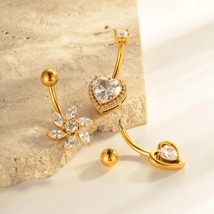 Gold stainless steel belly rings set with heart-shaped zircon and tassel flower design