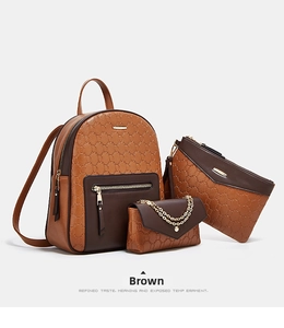 Three-piece brown backpack set with monogram pattern and gold chain detail