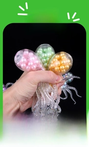 Close-up of a transparent octopus stress toy filled with colorful water beads