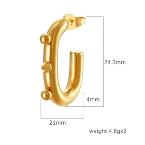Polished 18K gold-plated oval hoop earrings with spike studs and dimensions 24.3mm