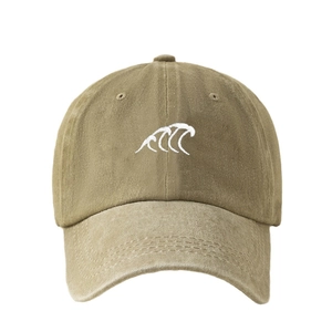 Khaki washed cotton baseball cap featuring white wave embroidery and a curved brim