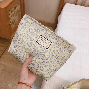 Chic floral mint green makeup bag with Time to Party label and premium embossed texture