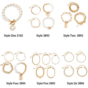 Faux pearl and gold chain bracelet set with rhinestone heart charms in six styles