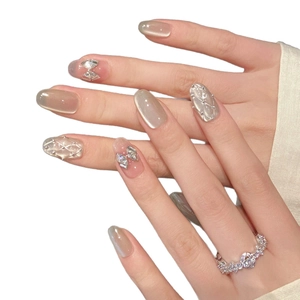 Unghie finte fatte a mano argento cat-eye con strass di lusso e design a fiocco