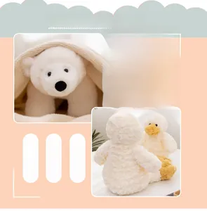 Detailed view of soft plush polar bear and duck dolls with fluffy filling and cute faces