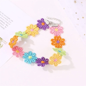 Detailed shot of multi-colored daisy floral choker with adjustable lobster clasp
