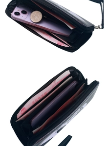 Macro view of long leather wallet interior with card slots and large phone pocket