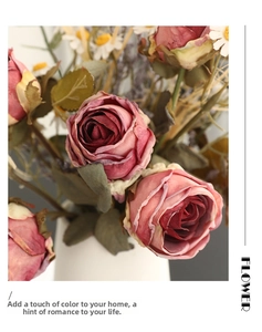 Detail of vintage burnt edge rose bouquet with daisies and realistic silk flower petals