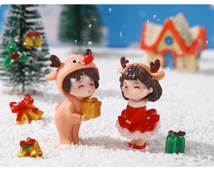 Detailed macro view of a couple in reindeer outfits for Christmas micro landscapes