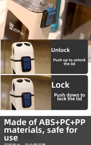 Detail view of portable water bottle with push-pull locking mechanism and 350ml scale