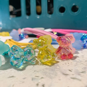 Colorful translucent gummy bear hair ties set for girls featuring vibrant elastic ropes