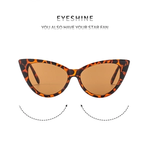 Close-up of elegant tortoiseshell cat-eye sunglasses with vintage amber lenses