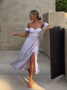 Lavender floral off-shoulder maxi dress with puff sleeves and thigh-high side slit