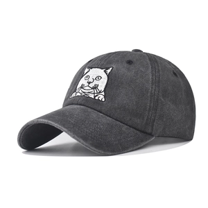 Washed dark grey canvas baseball cap featuring a white cat face embroidery in retro style