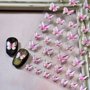 Elegant 3D butterfly embossed nail art stickers with pink gradient and glitter finish