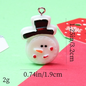 Detailed size view of a small resin snowman pendant for DIY crafts and jewelry making