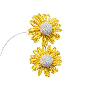 Handmade woven yellow flower earrings with white bead center for summer beach vacations