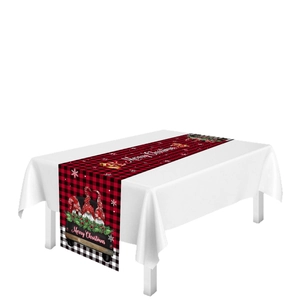 Christmas table runner with red black plaid pattern featuring Santa gnomes and truck