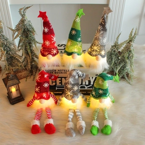 LED lighted Christmas gnomes collection in red, green and grey colors for home decor