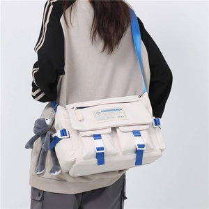 Japanese style retro beige messenger bag with blue straps and large capacity for men