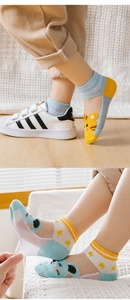 Detail of breathable mesh kids' socks with tiger pattern and high elasticity texture