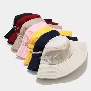 Foldable wide brim bucket hat with rhinestone pin in various colors for sun protection