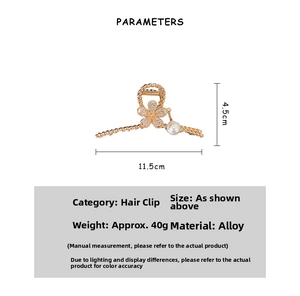 Detailed size chart of gold floral hair claw clip showing 11.5cm length and pearl detail