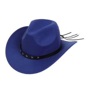 Detail of royal blue western cowboy hat with black star rivets and decorative fringe