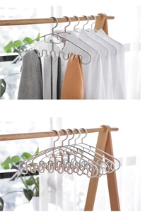 Ruimtebesparende golfvormige plastic hanger voor hemdjes en sjaals in pastelkleuren