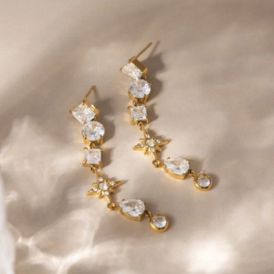 Boucles d'oreilles en acier inoxydable doré 18K avec pompons étoiles et zircons