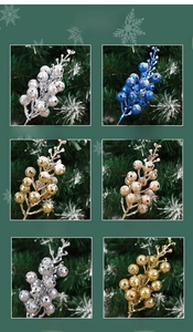 Detail of Christmas artificial glitter berries available in silver gold and blue styles