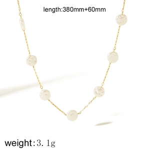 18K gold plated stainless steel necklace with white baroque pearls and shell accents