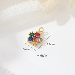 Macro detail of 14k gold plated flower pendant with colorful cubic zirconia and dimensions