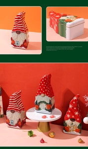 Close-up of festive gnome-shaped tin boxes for Christmas candies and holiday cookies