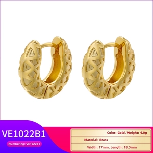 Detail of 18K gold plated brass hoop earrings with hollow geometric triangle design