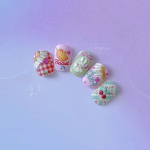 Detailed macro view of 5D embossed Japanese nail art with cute 3D bunny and plaid patterns