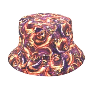 Close-up of psychedelic purple and orange 3D marble print on a durable canvas bucket hat