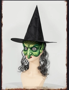 Detailed view of Halloween witch set with green latex mask, pointed hat and grey wig