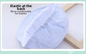 Macro detail of baby cap back elastic band for comfortable fit on newborn knit cotton hat