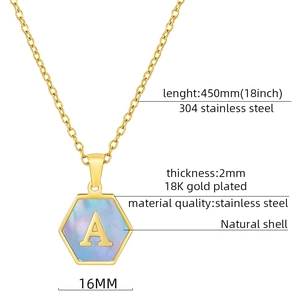 Detail of 18K gold-plated hexagonal pendant with blue shell A-letter inlay