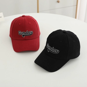 Close-up of Sunday letter embroidery on high-quality red and black cotton baseball caps