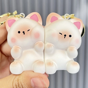 Couple cat keychains in white and pink, cartoon resin charms for bags with gold rings
