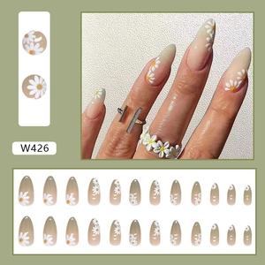 Green gradient almond press-on nails with white daisy flowers and French tips