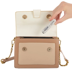 Silver rhinestone perfume atomizer and PU leather handbag for travel essentials