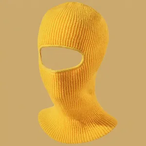 Bright yellow ribbed knit balaclava mask for winter protection with eye opening